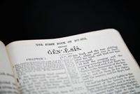 Photo of Bible open to the book of Genesis